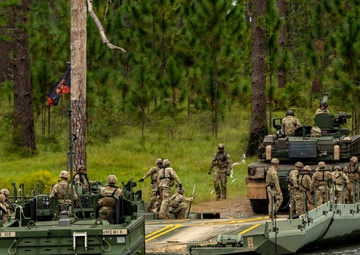 Raiders and Black Diamonds conduct wet gap crossing