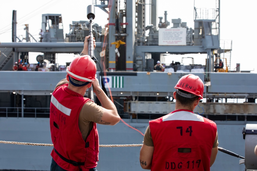 USS Ralph Johnson conducts RAS.