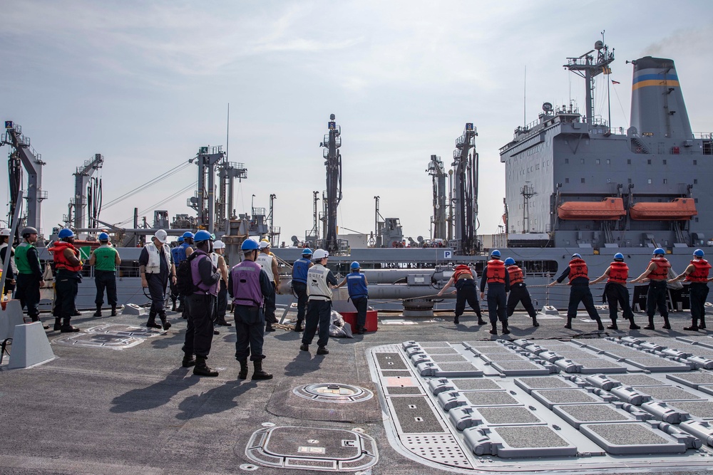 USS Ralph Johnson conducts RAS.