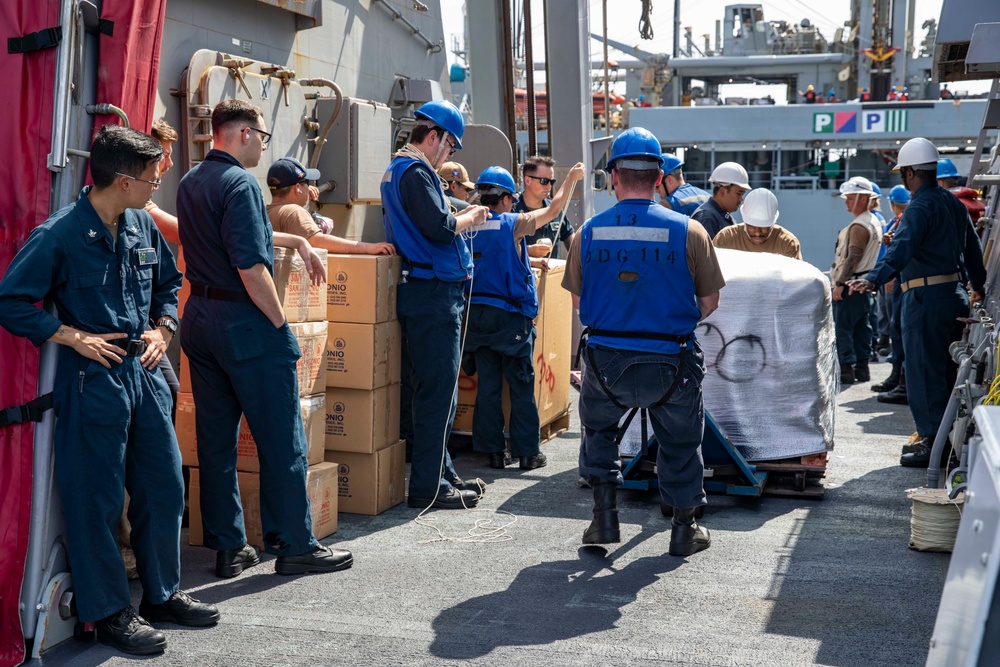 USS Ralph Johnson conducts RAS.