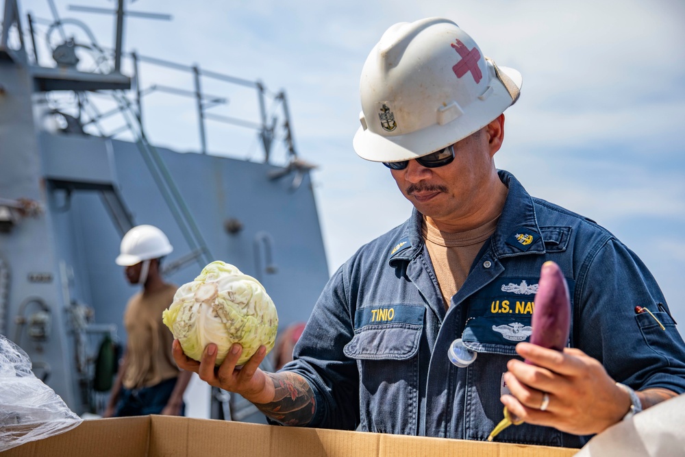 USS Ralph Johnson conducts RAS.