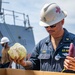 USS Ralph Johnson conducts RAS.