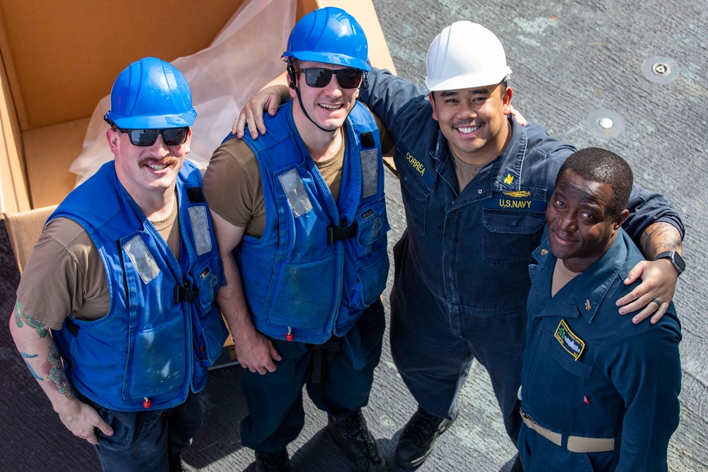 USS Ralph Johnson conducts RAS.