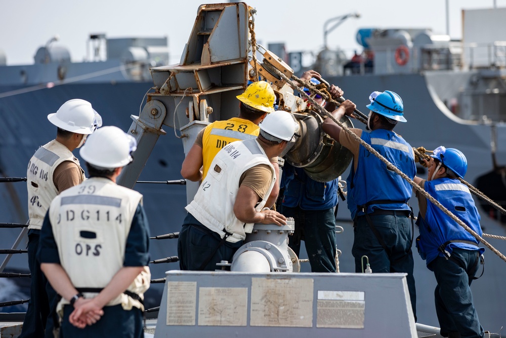 USS Ralph Johnson conducts RAS.