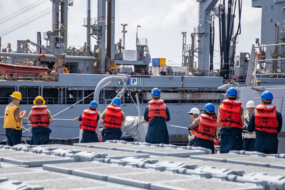 USS Ralph Johnson conducts RAS.