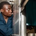 USS Ronald Reagan (CVN 76) Sailors install dishwasher