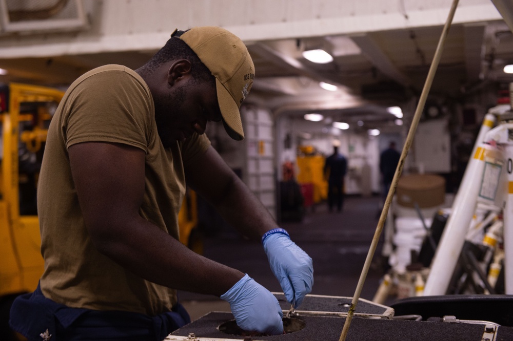 USS Ronald Reagan (CVN 76) Sailors conduct daily maintenance