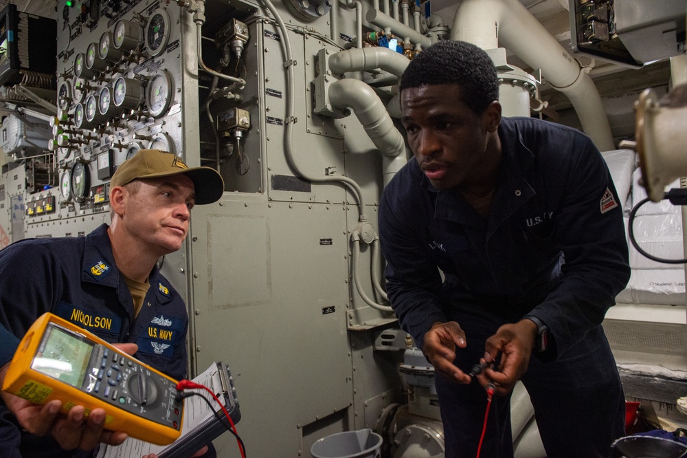 USS Ronald Reagan (CVN 76) Sailors conduct daily maintenance