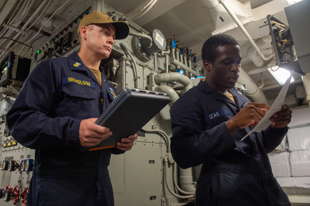 USS Ronald Reagan (CVN 76) Sailors conduct daily maintenance