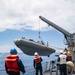 USS Ralph Johnson conducts boat ops.