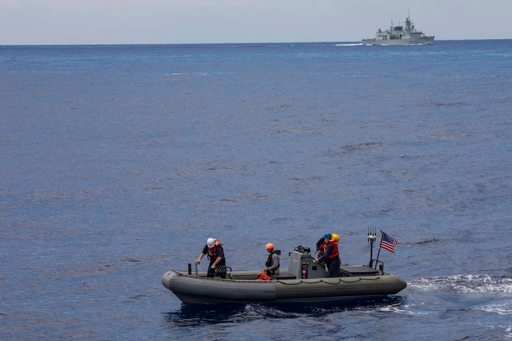 USS Ralph Johnson conducts boat ops.