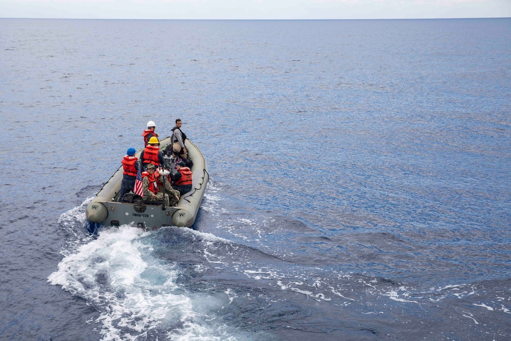 USS Ralph Johnson conducts boat ops.