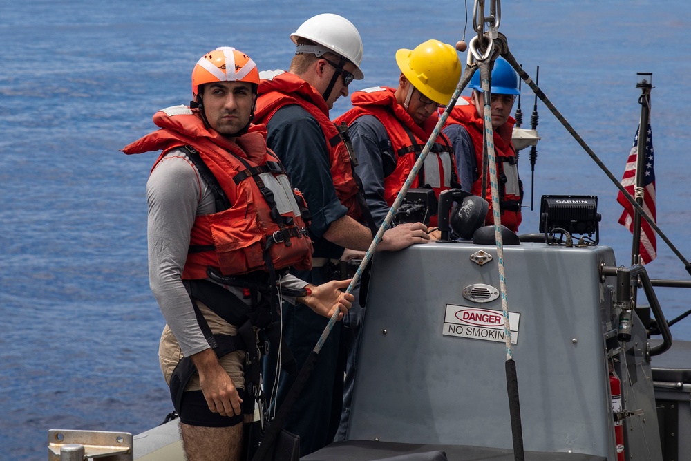 USS Ralph Johnson conducts boat ops.