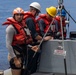 USS Ralph Johnson conducts boat ops.