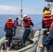 USS Ralph Johnson conducts boat ops.