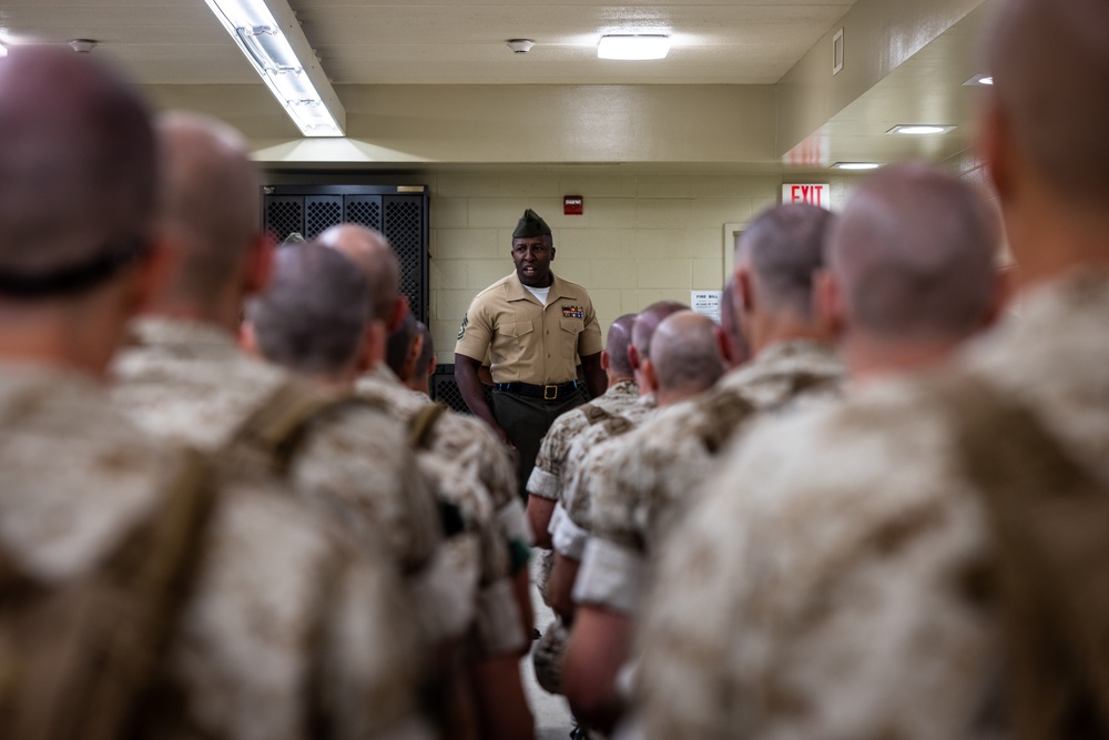 U.S. Marine Corps Candidates with Officer Candidate School receive their sergeant instructors