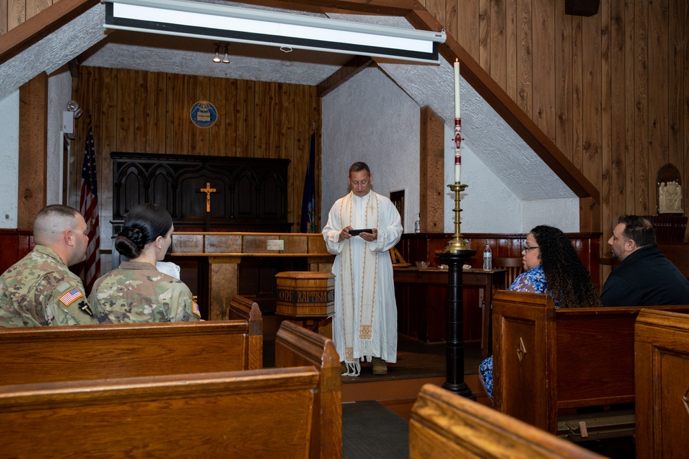 New York National Guard Soldiers baptize daughter at Camp Smith