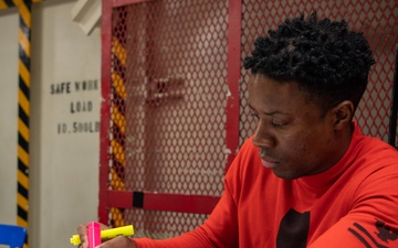 U.S. Navy Sailor Studies For Exam