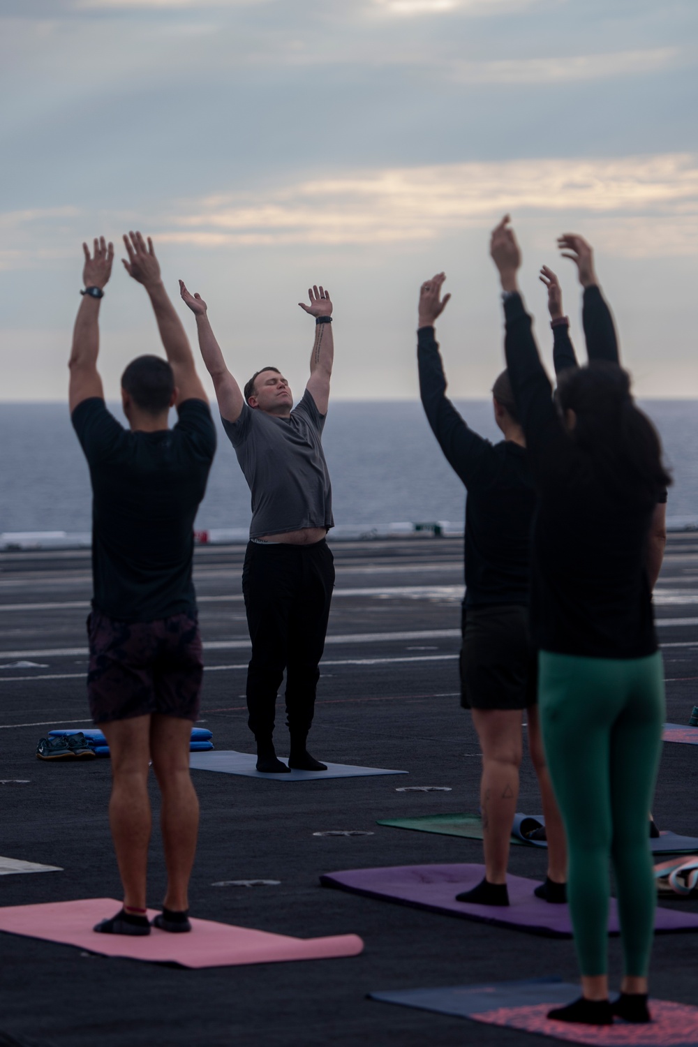 U.S. Navy Sailors Do Yoga On Flight Deck