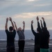 U.S. Navy Sailors Do Yoga On Flight Deck