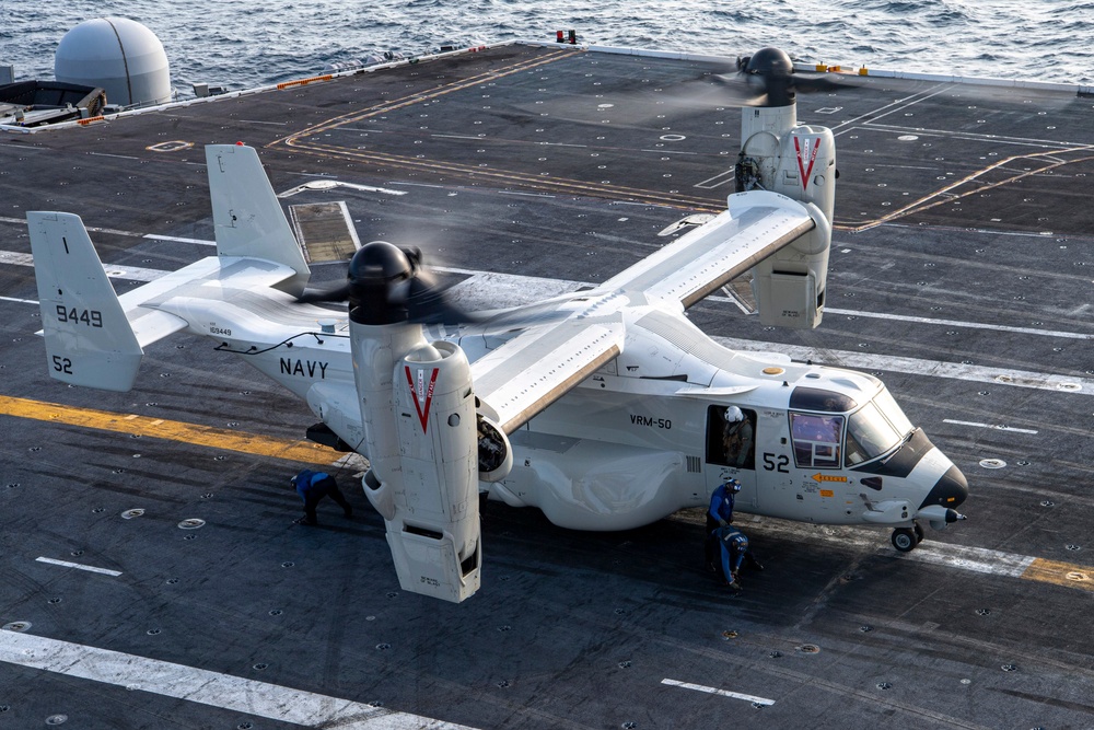 A CMV-22B Osprey Gets Chained Down