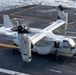 A CMV-22B Osprey Gets Chained Down