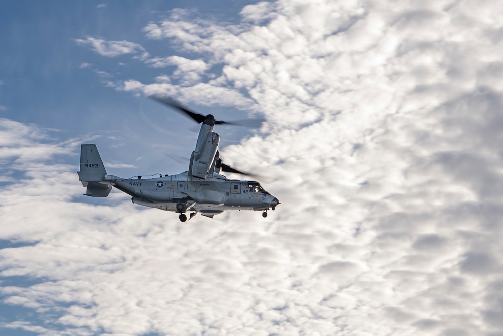 A CMV-22B Osprey Flies Alongside USS Nimitz