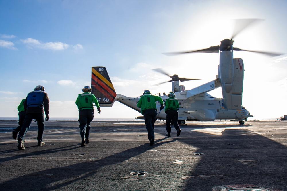 Sailors Prepare to Remove Chock and Chains