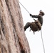 Marines with 1st Bn., 1st Marines master maneuvering across cliff face