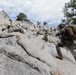 Marines with 1st Bn., 1st Marines master maneuvering across cliff face