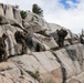 Marines with 1st Bn., 1st Marines master maneuvering across cliff face
