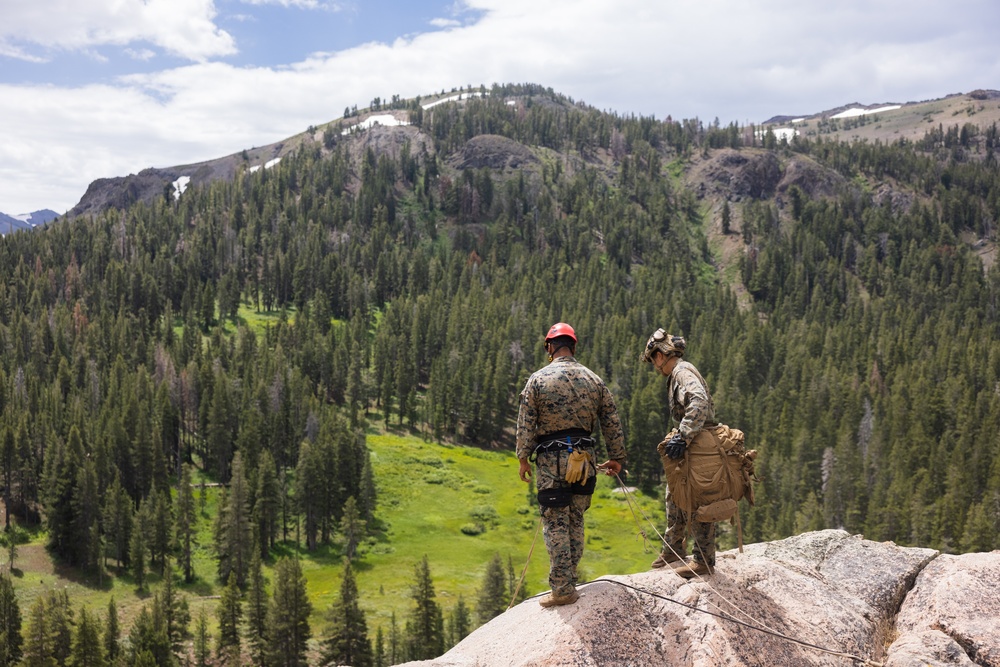 Marines with 1st Bn., 1st Marines master maneuvering across cliff face