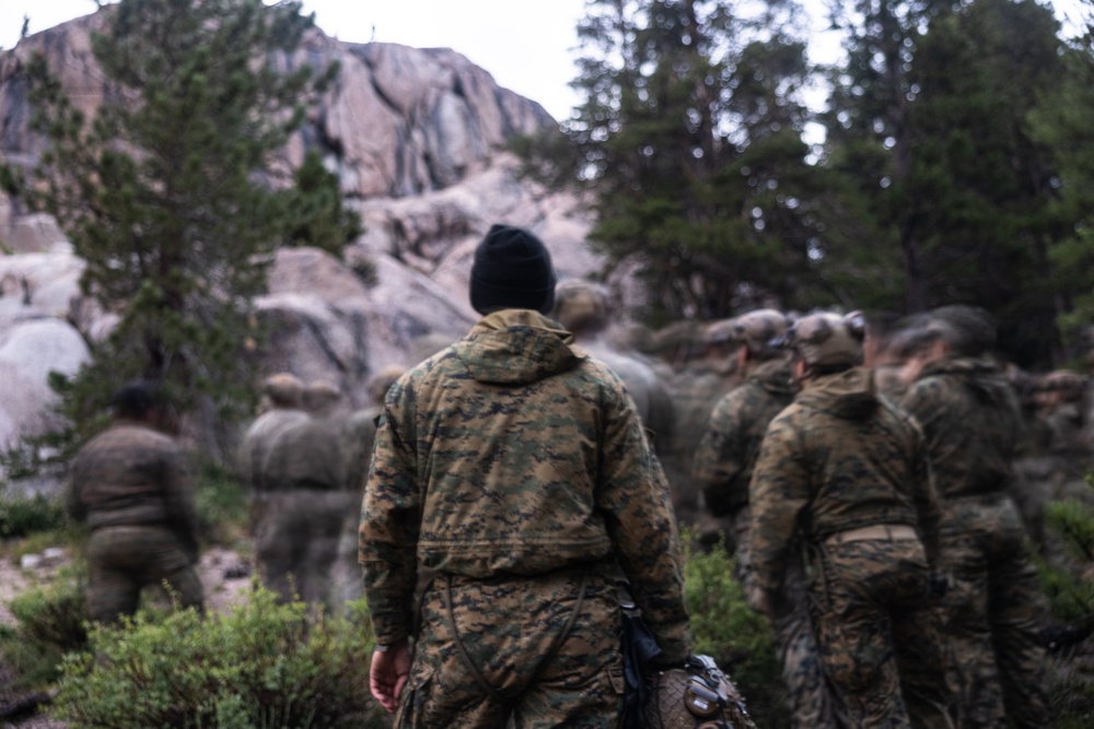 Marines with 1st Bn., 1st Marines master maneuvering across cliff face