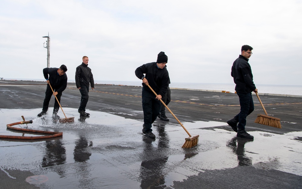 Sailors Scrub the Flight Deck