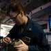 Sailor Prepares To Calibrate Component