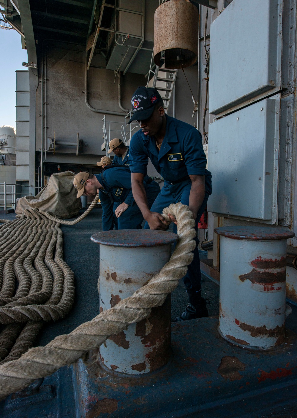 Sailors line handling.