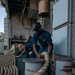 Sailors line handling.