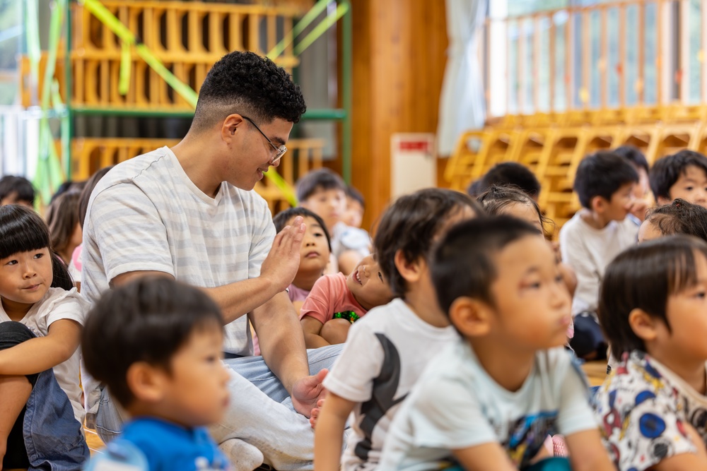 Head, shoulders, knees and toes: U.S. Marines from Marine Corps Air Station Iwakuni visit local preschools