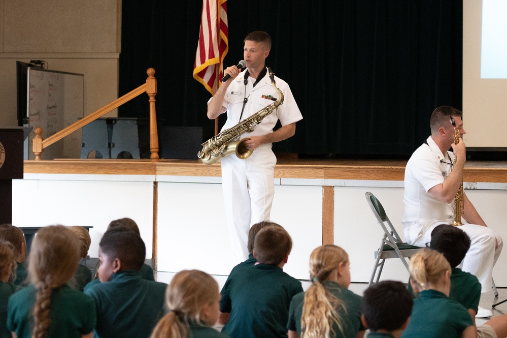 U.S. Navy Band Saxophone Quartet performs a Music in the Schools concert