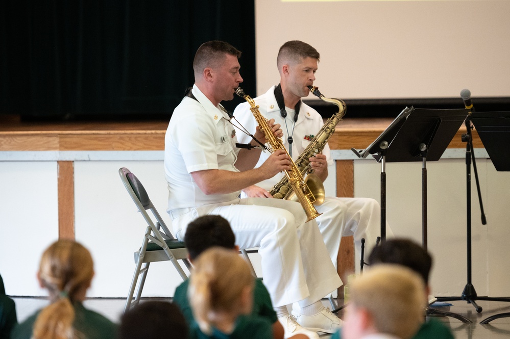 U.S. Navy Band Saxophone Quartet performs a Music in the Schools concert