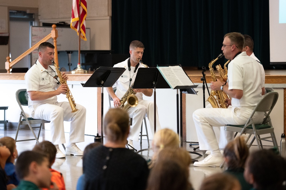 U.S. Navy Band Saxophone Quartet performs a Music in the Schools concert
