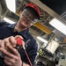 USS Dewey (DDG 105) Sailors Conduct Routine Operations in the Ship's General Workshop