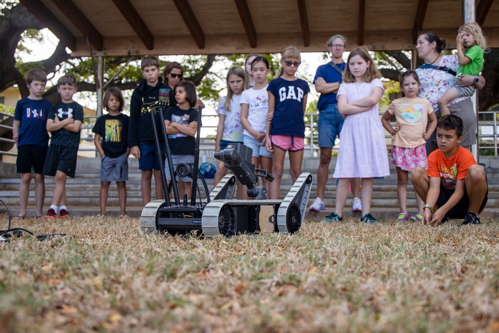 Armed with Knowledge: Military Homeschoolers of Hawaii receive military technology demonstration.