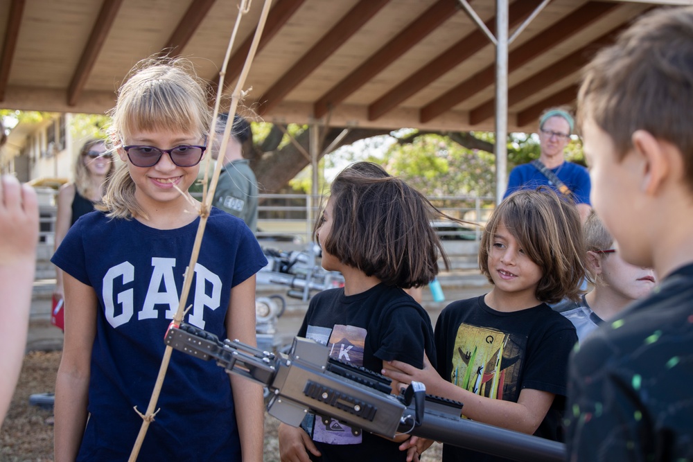 Armed with Knowledge: Military Homeschoolers of Hawaii receive military technology demonstration.