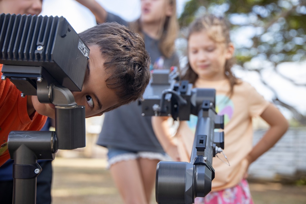 Armed with Knowledge: Military Homeschoolers of Hawaii receive military technology demonstration.