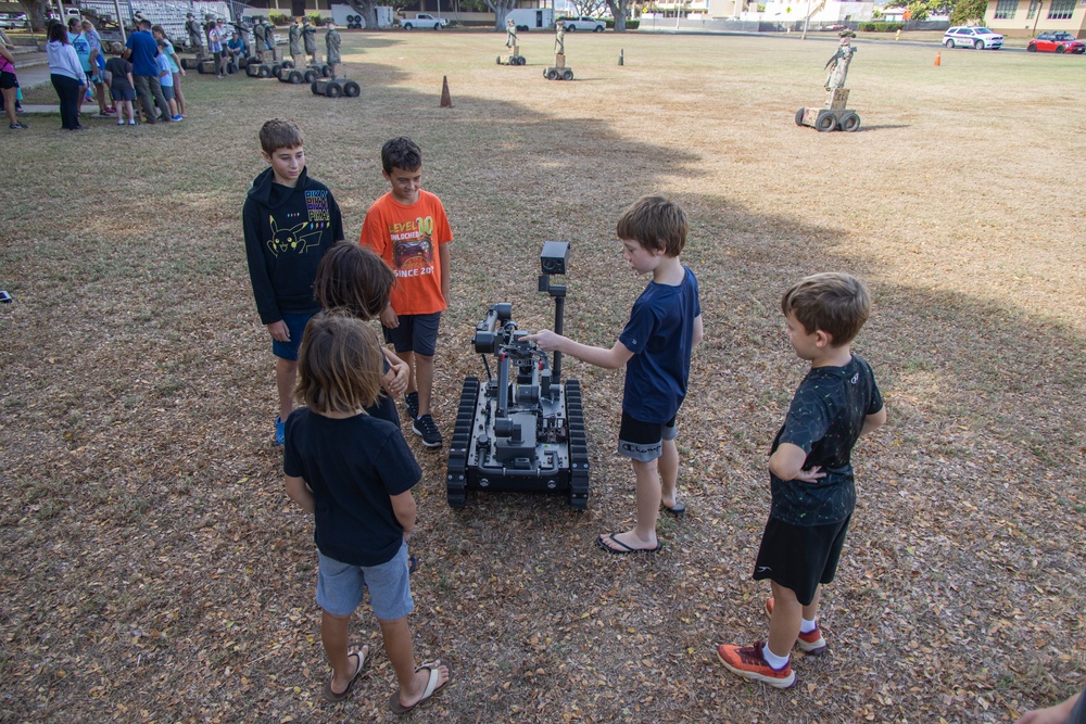 Armed with Knowledge: Military Homeschoolers of Hawaii receive military technology demonstration.