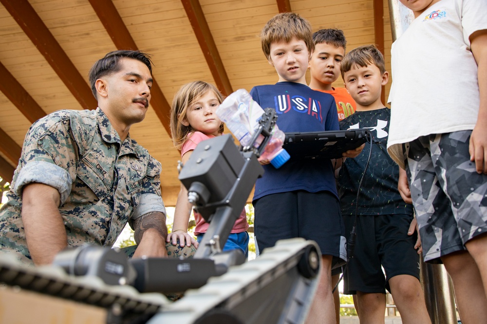 Armed with Knowledge: Military Homeschoolers of Hawaii receive military technology demonstration.