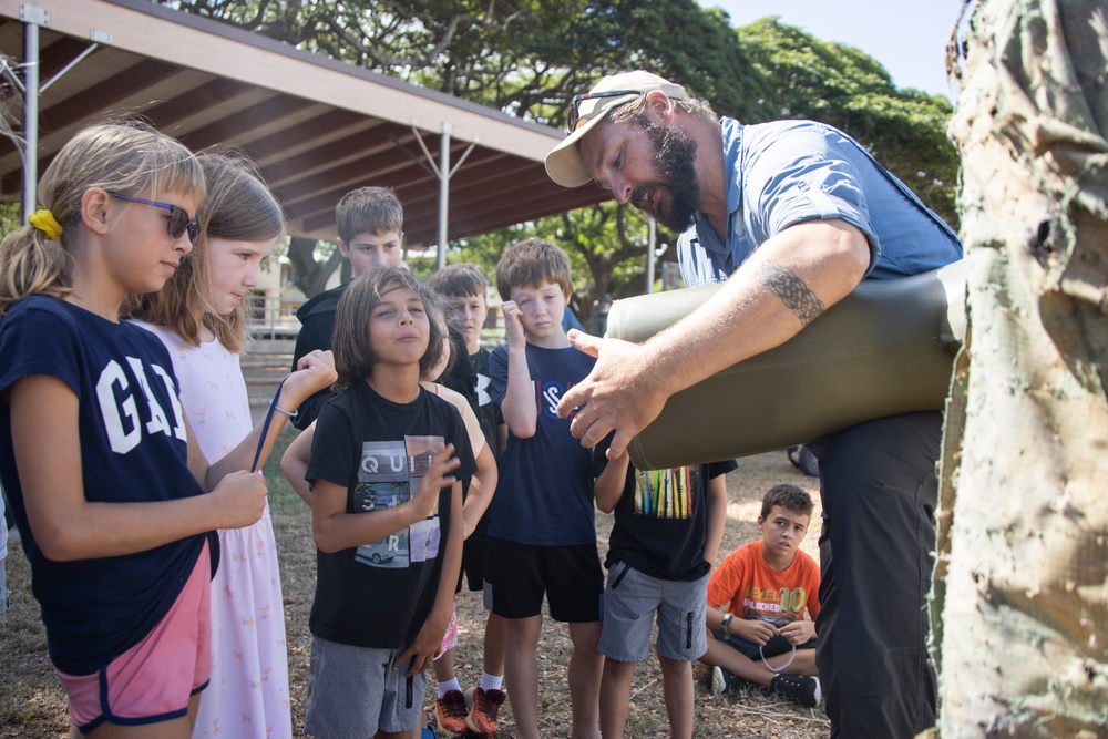 Armed with Knowledge: Military Homeschoolers of Hawaii receive military technology demonstration.