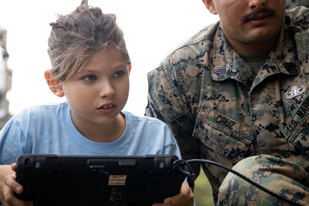 Armed with Knowledge: Military Homeschoolers of Hawaii receive military technology demonstration.