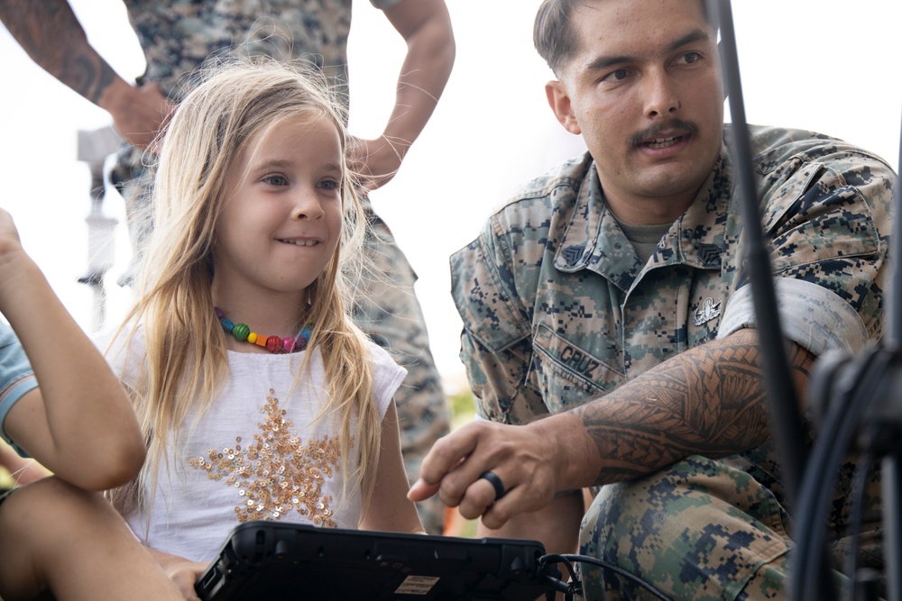 Armed with Knowledge: Military Homeschoolers of Hawaii receive military technology demonstration.